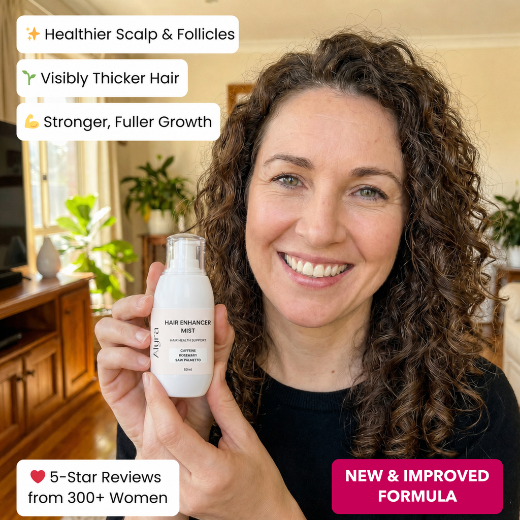 Woman holding the new Alyra Hair Enhancer Mist, New & Improved Formula