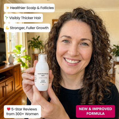 Woman holding the new Alyra Hair Enhancer Mist, New & Improved Formula